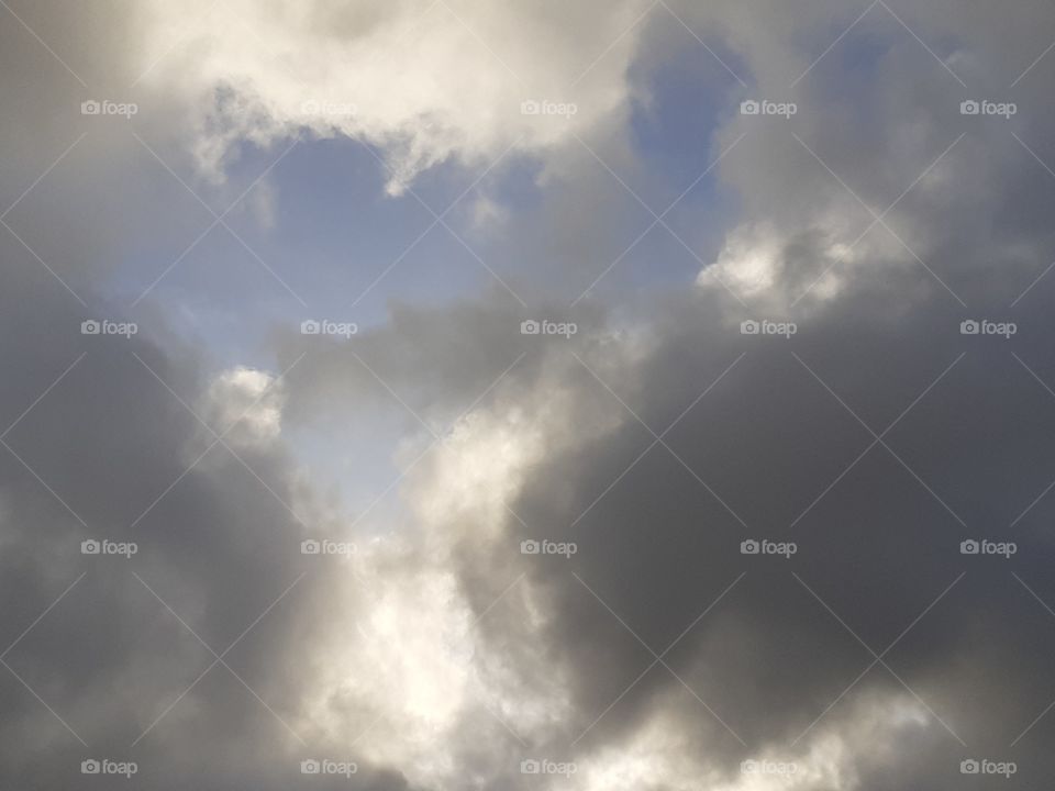 The sky behind the clouds