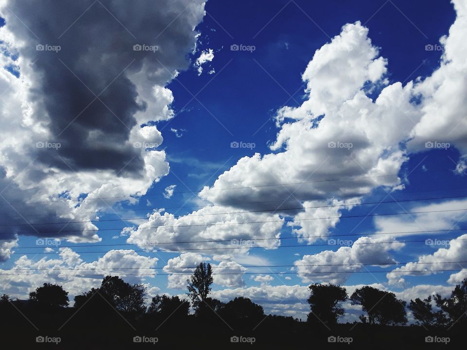 A peaceful cloudy skies at summertime.