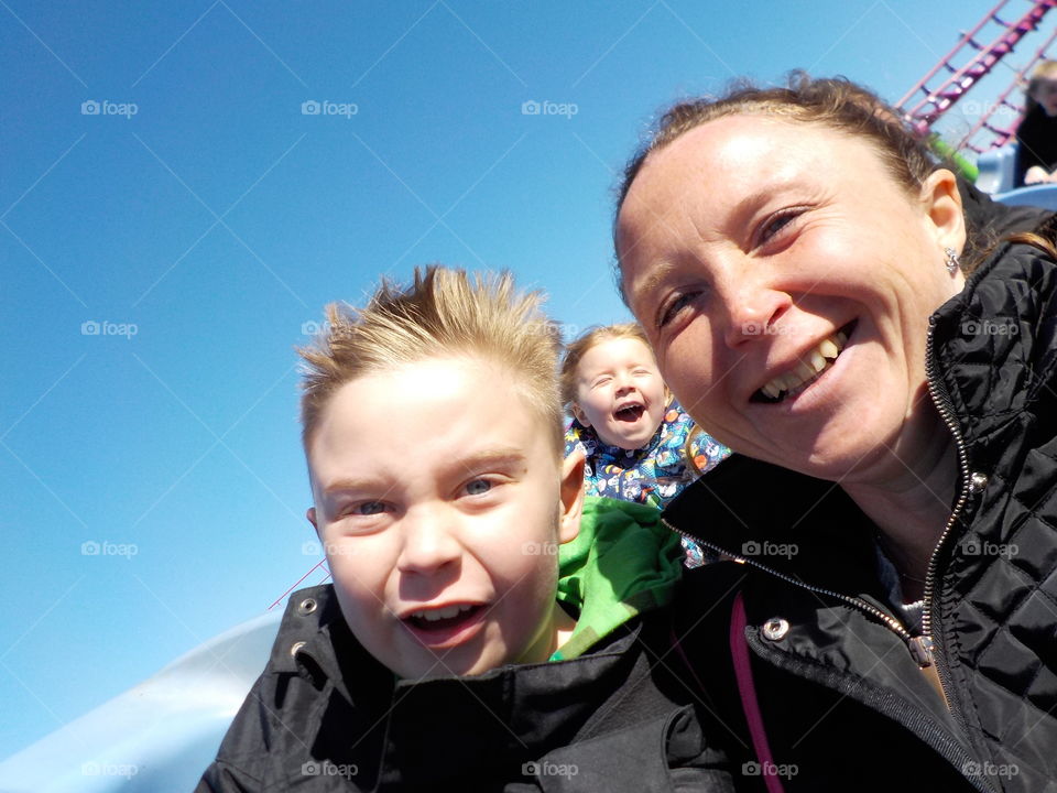 Selfie on a rollercoaster with kids 