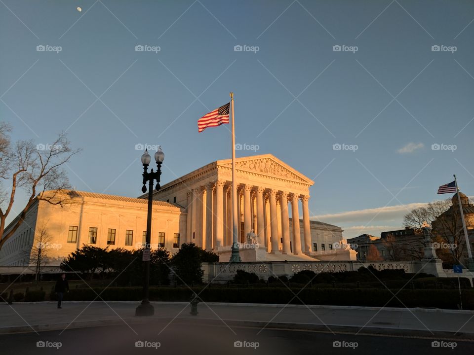 The United States Supreme Court is seen at sunset. (Image source: Jon Street Media)