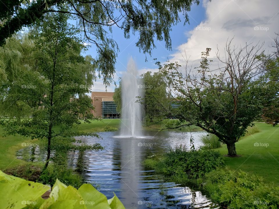 Water fountain, round pond, Bryant university Rhode Island