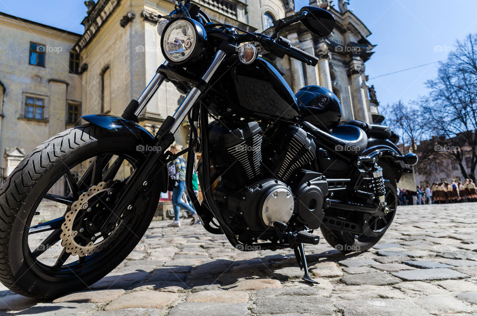 Black classic motorcycle on the street