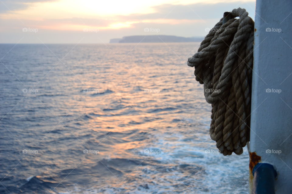 Rope at sunset on the ship 