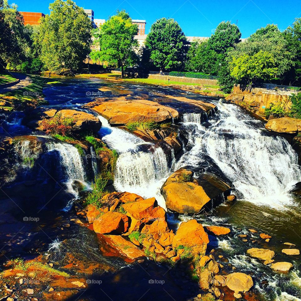 Very famous waterfall at falls park in Greenville South Carolina. Picture was taken over the Liberty bridge :) 