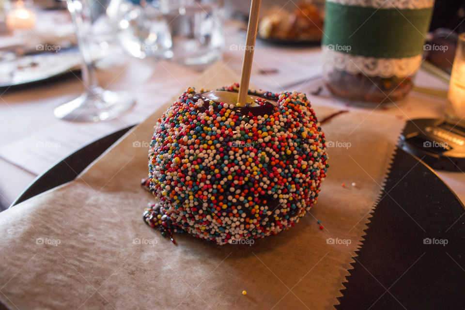 Caramel apple with sprinkles