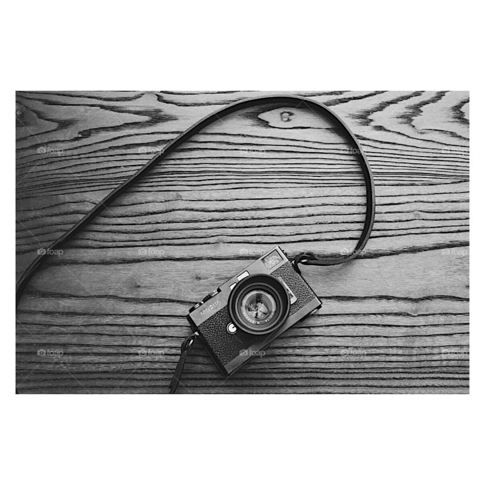 Minolta CLE analog camera shot in b&w film with Leica m6