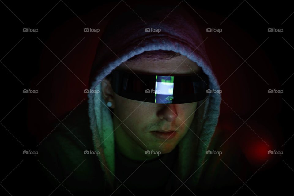 Close-up of man wearing safety glasses