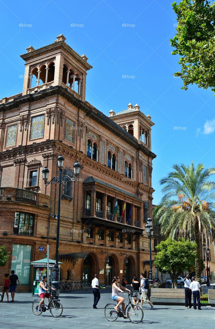 Photograph of people cycling in Sevilla, Andalucía, Spain.