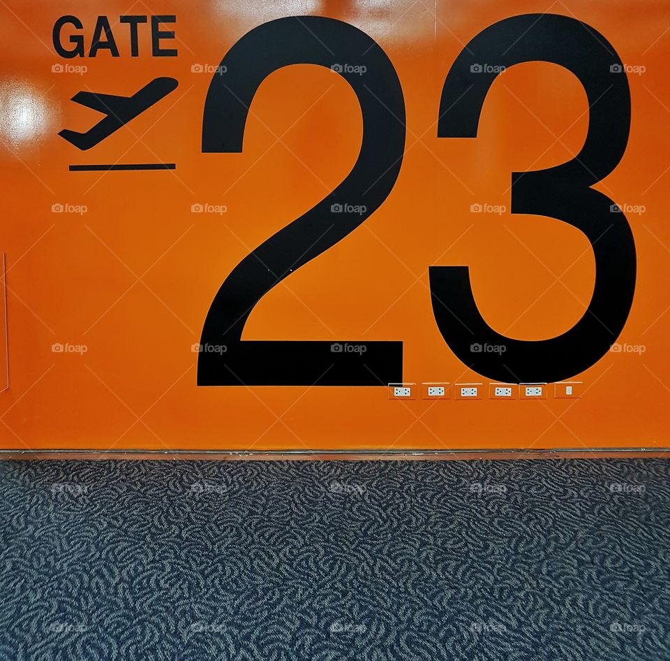 orange gate 23 at the airport