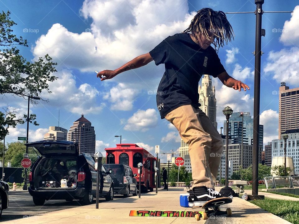Skateboarding in the city.