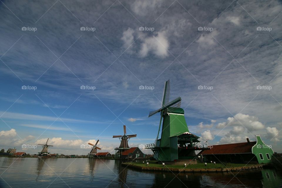 windmills in a row. this is a tourist attraction in zaandam, a little place in holland!