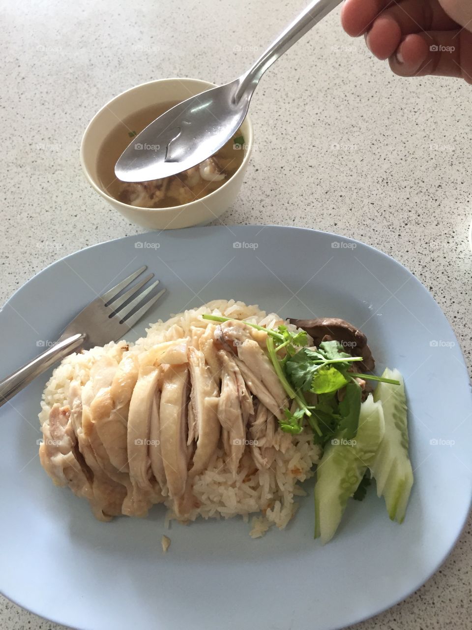 Steam rice with chicken topped 