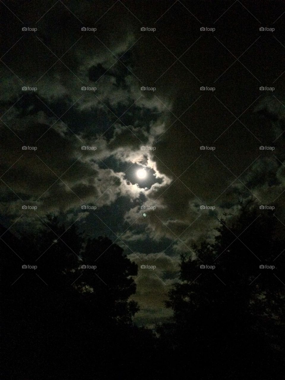 Clouds around the moon