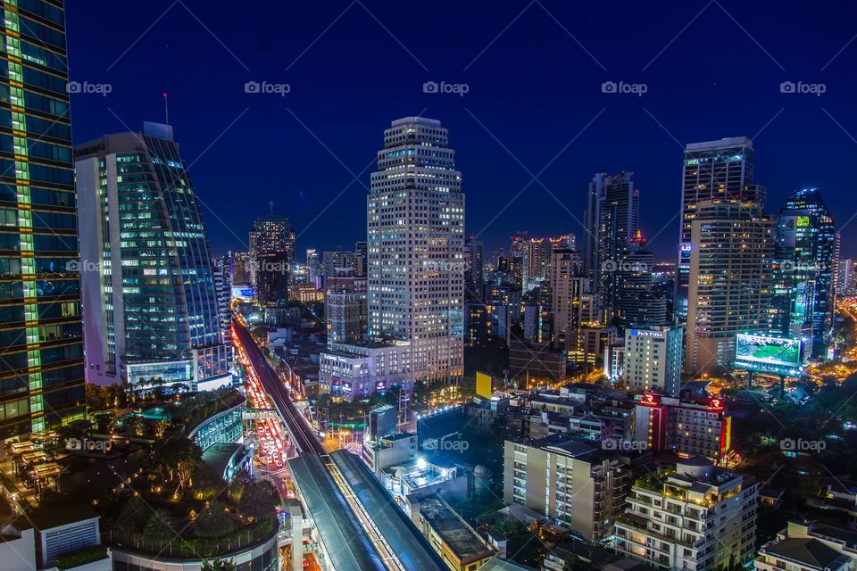 Blue time in Bangkok . Amazing View on Asoke intersection, lights are on for the night show