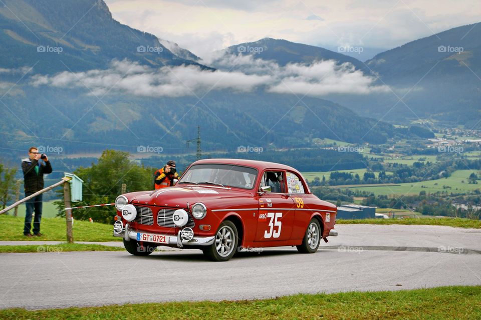 Beauty . Beautiful oldtime Volvo is one of the stars of a classic cars rally in the magnificent alpine scenery 