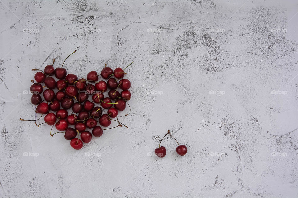 the heart made of sweet cherry