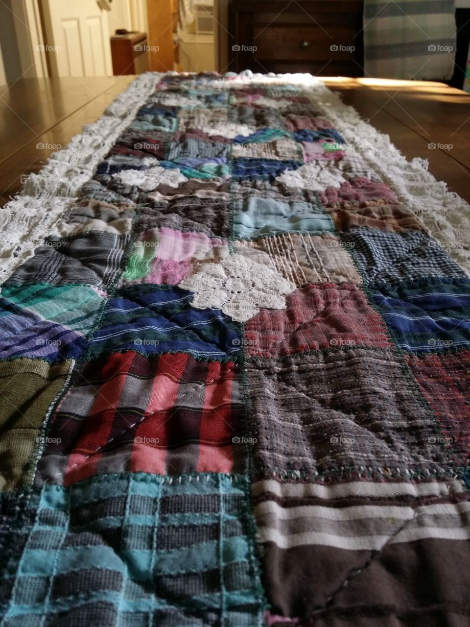 Table runner made out of old shirts