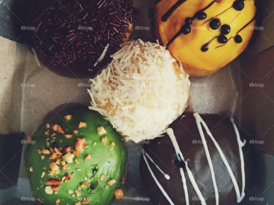 when you feel not good, eat this sweet delicious doughnut. it's can make you happy