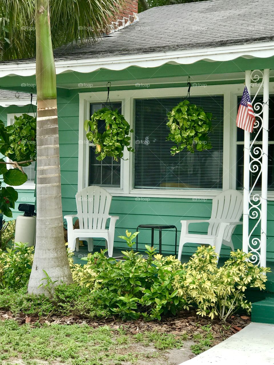 Pretty green front porch 