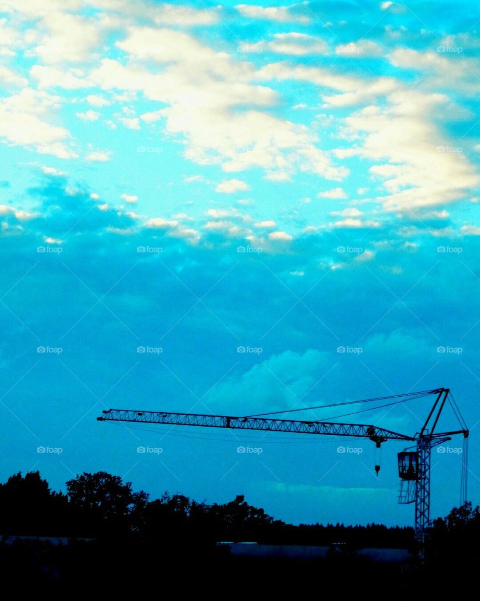 crane against the cloudy background