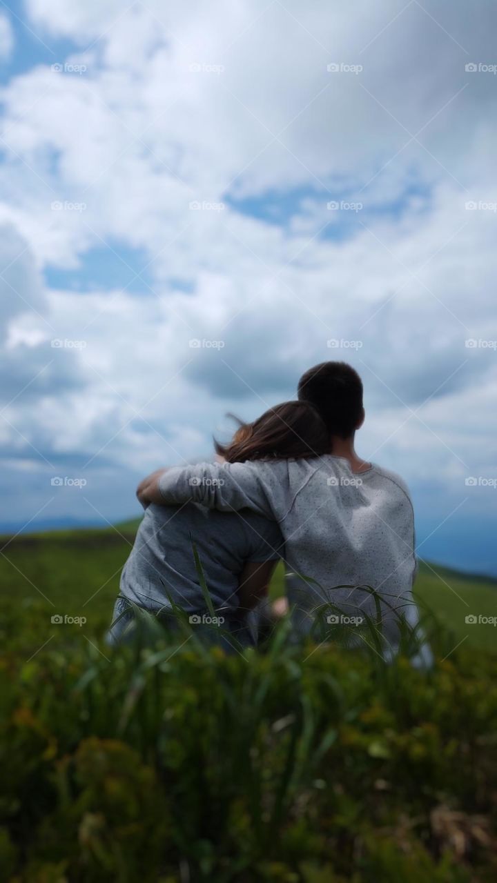 Touching fluffy clouds