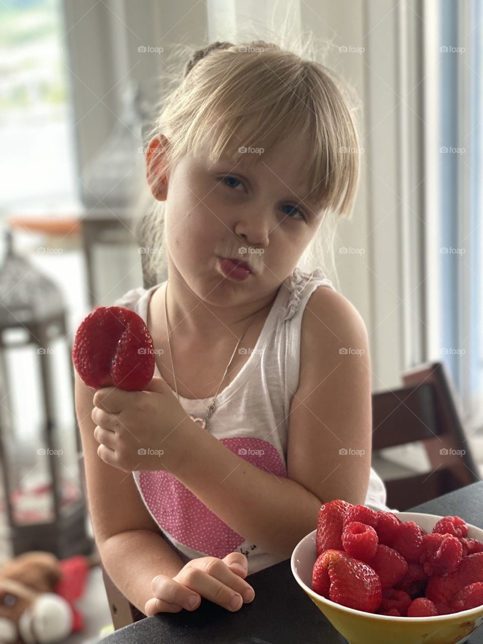 eating strawberries at the table