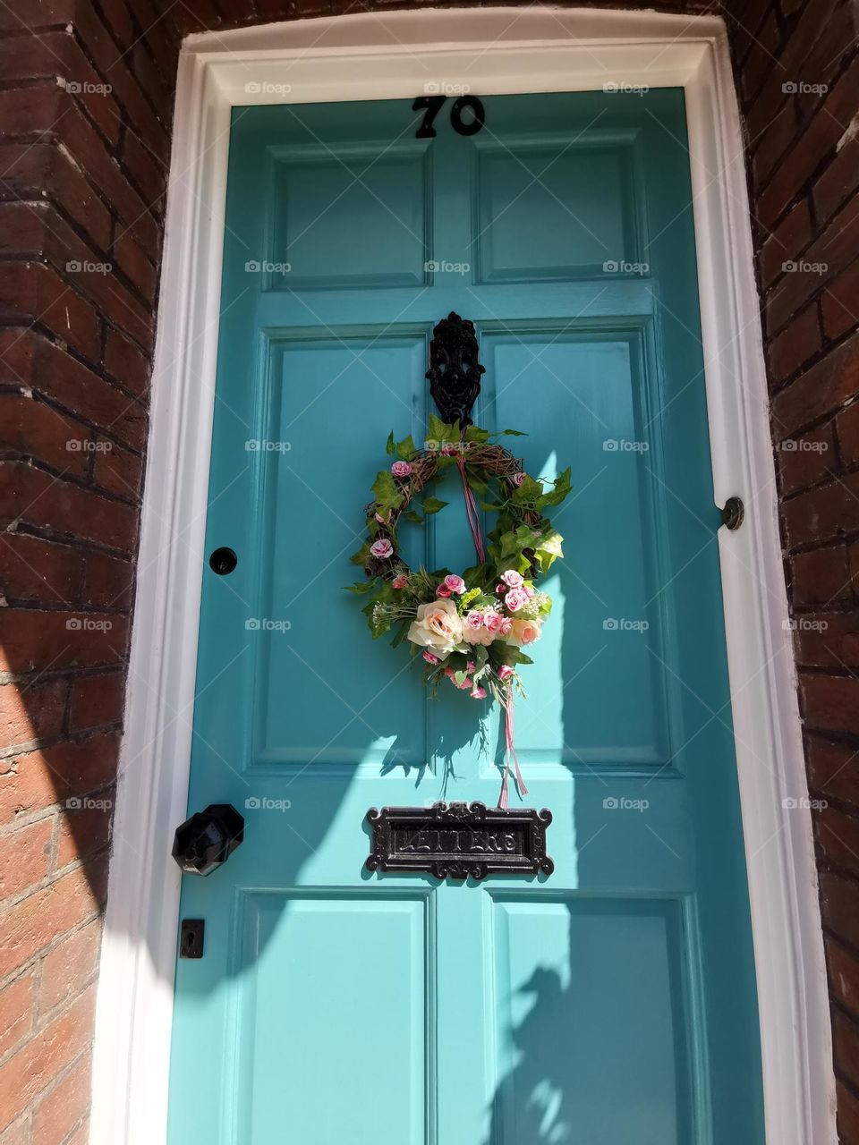 Doors decorated with Easter wreath.