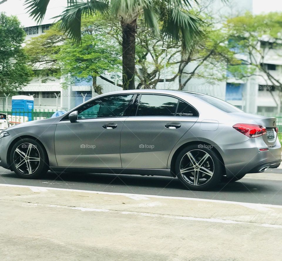 Gray colour car on road 