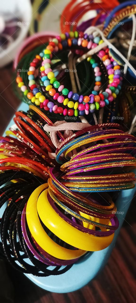 bangles are the tradition that married women wear bangles for their husbands life and health. long life relationship  they should live in.