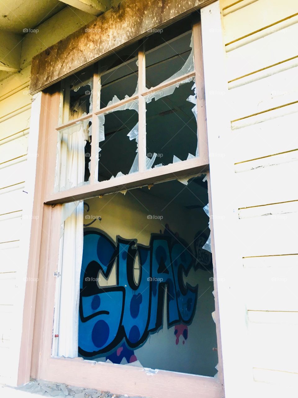 This broken window is on one of the many buildings on the former Fort Ord military installation in Monterey County. Now, youth like to hang out in the dilapidated abandoned buildings and graffiti the walls. 