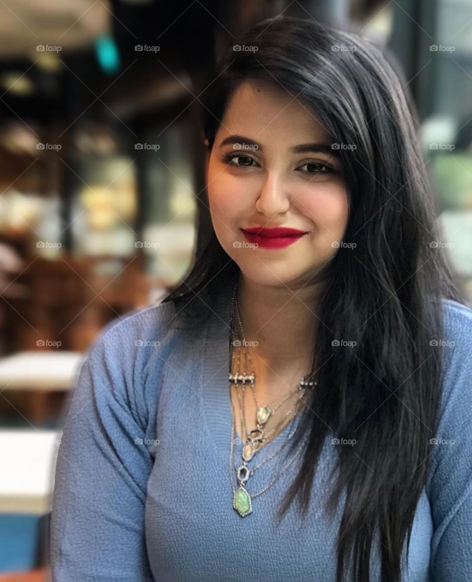 Pearls fall in her smile