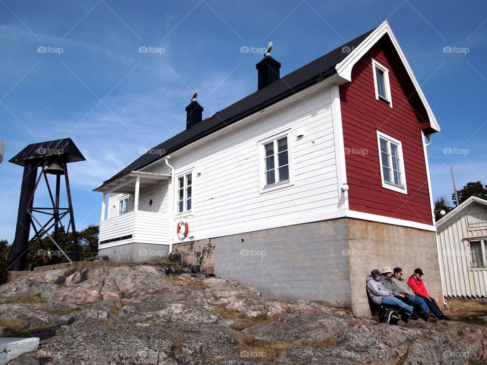 house hus rocks lighthouse by istvan