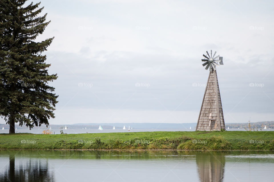 Windmill on the edge of the pond