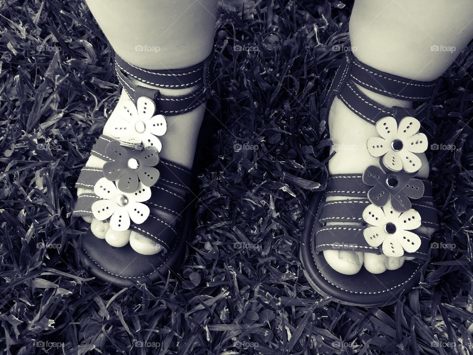 girl shoes on grass