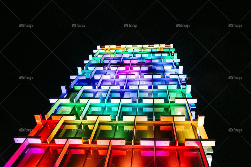 Colored lights to create rainbow building at night