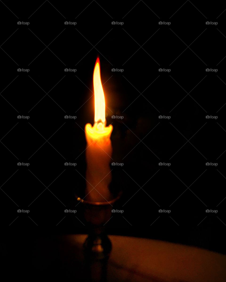 Candle light in a darkness 
