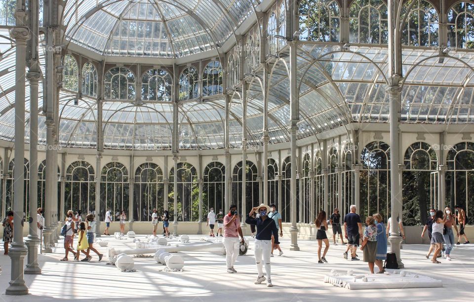 The Palacio de Cristal is a former conservatory in the Parque del Buen Retiro.  Madrid, Spain. Constructed in 1887.
Nowadays used as an art exhibition building.