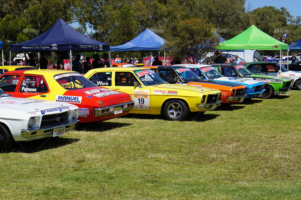 Holden HQ's. Holden HQ race cars between races in the pits