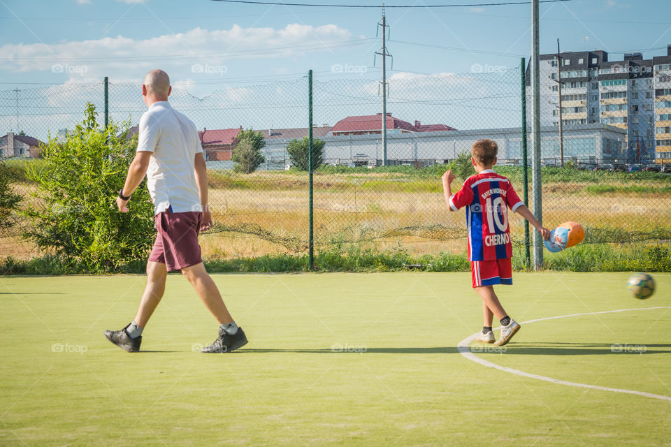 Father and sun in the field