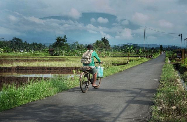farmer bike to work in the morning