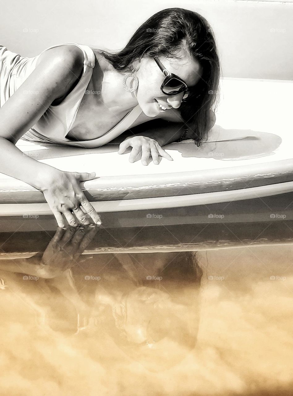 smiling to your water reflection