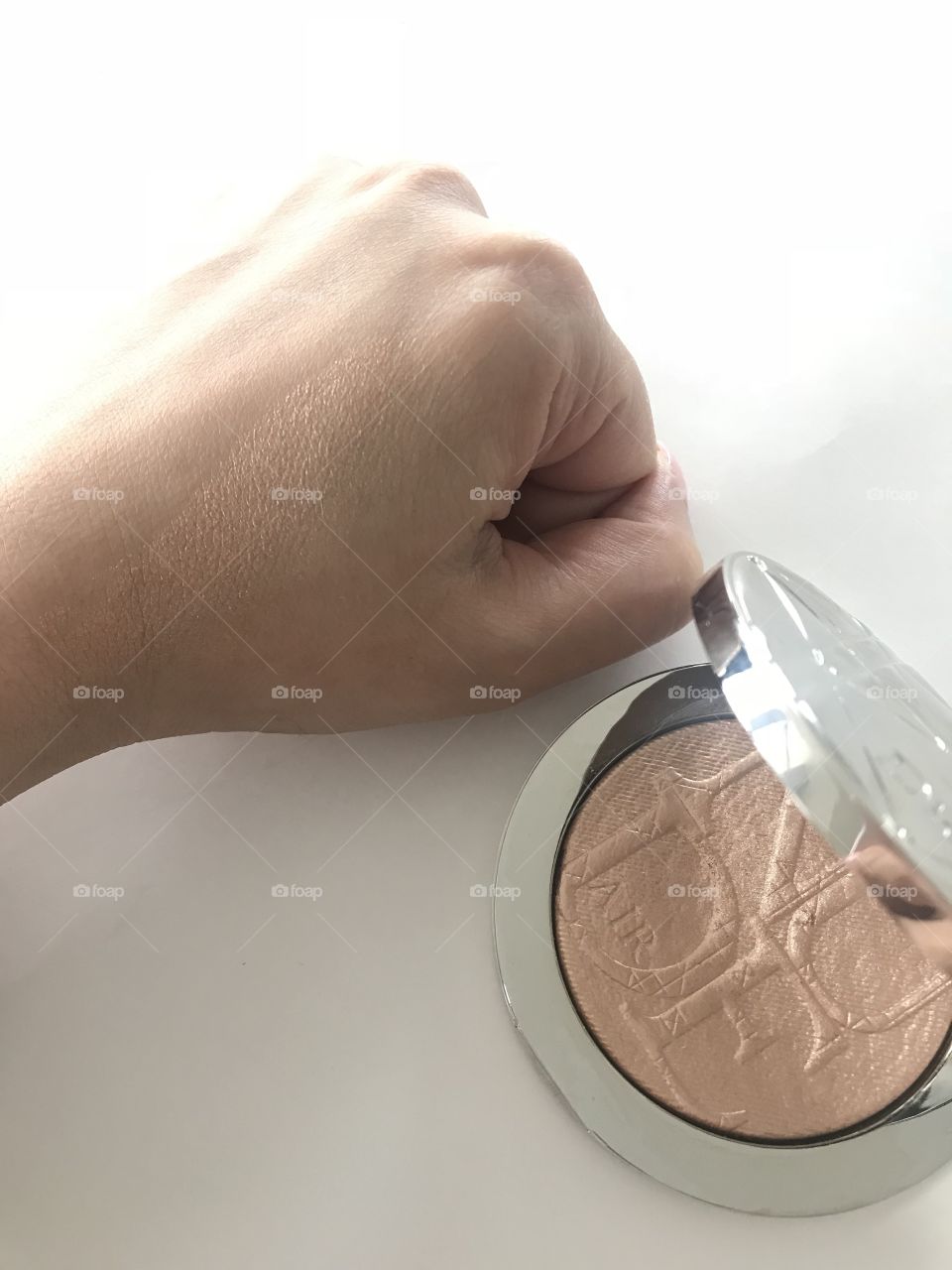 Makeup swatches of dior glow highlighter. Makeup luxury brands are key for wealth. 