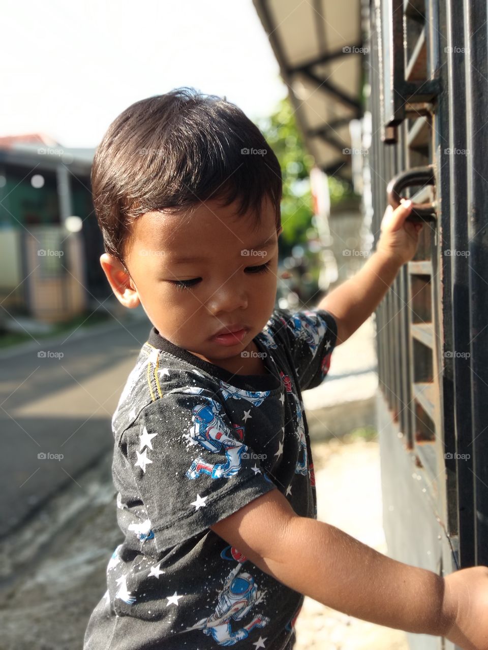 Playing in front of the gate