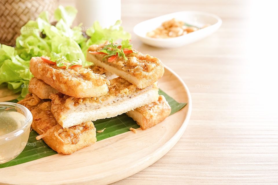 Appetizer. Asian appetizer of crispy shrimp sandwich or shrimp toast. Served with sweet plum sauce. Selective focus