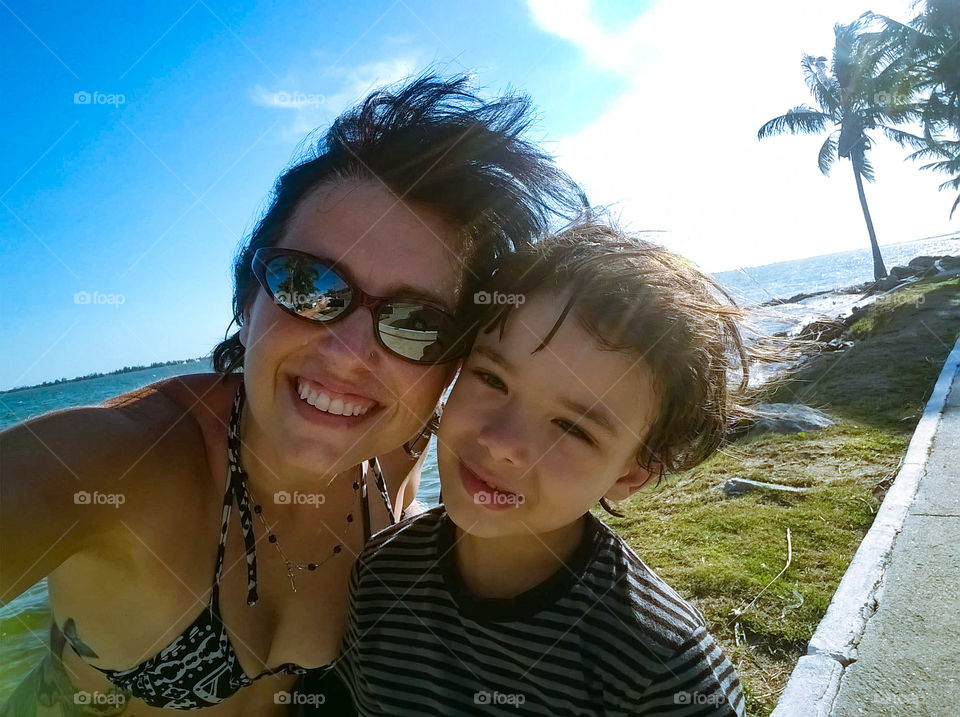 mother and son in the beach