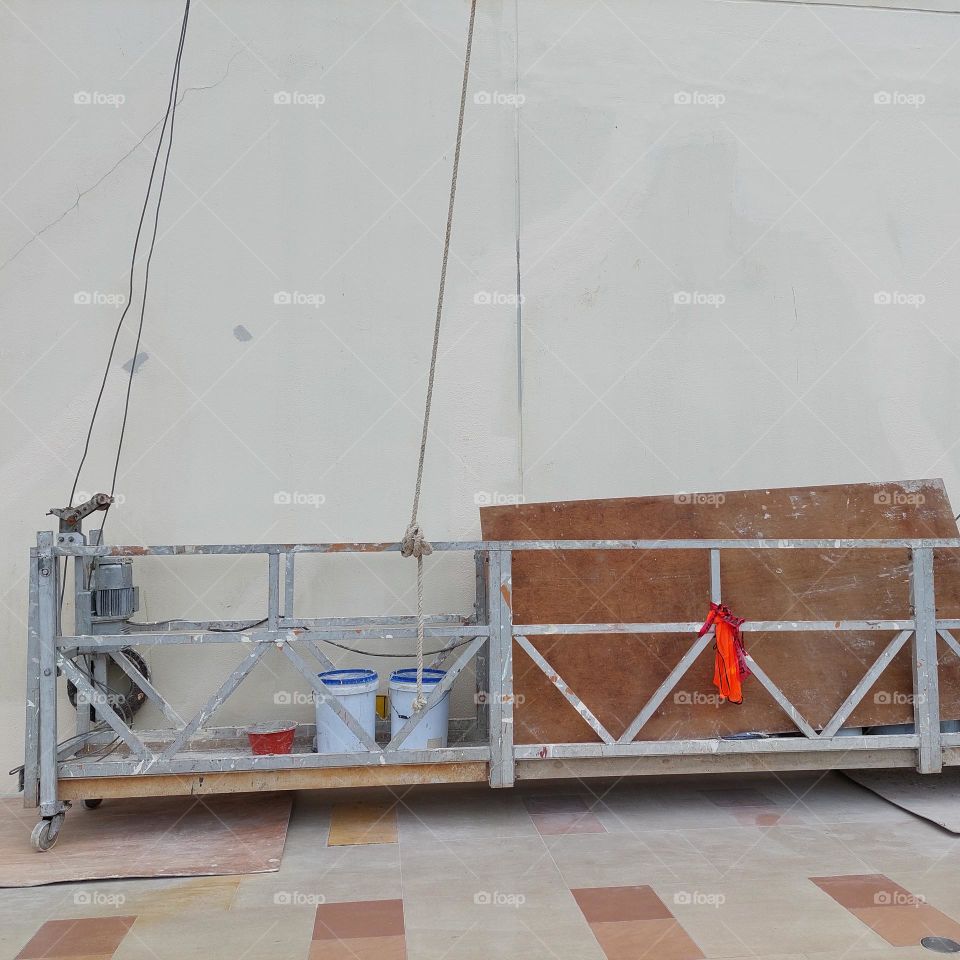 gondola, a tool used to clean glass and the outside of the building