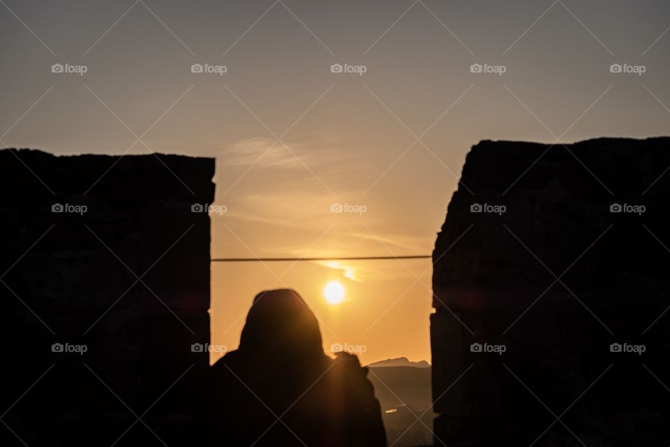 Silhouette photo of camera man when take sunrise photo
