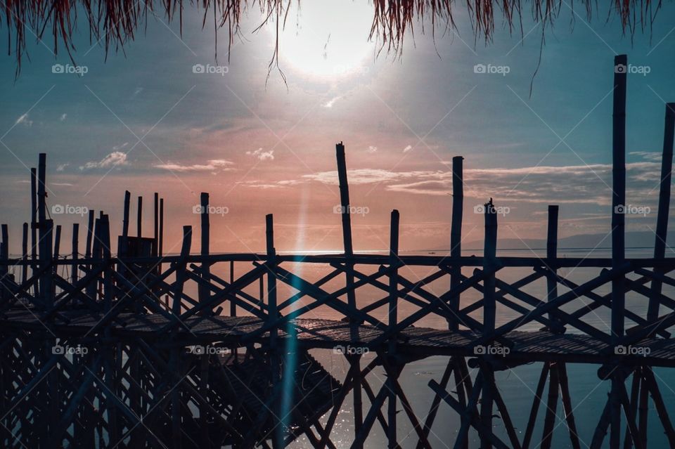 Ever witnessed the sun out while walking down the man-made bamboo pathway? Late in the afternoon, the heat's unbearable by the sea, watching the almost setting sun, with people dear to you. ♥