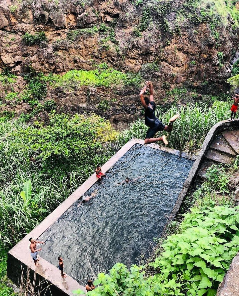 Group of people swimming a very comfortable mountain pool