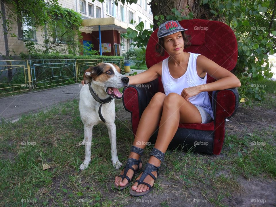 Friends. Brunette with cute dog 